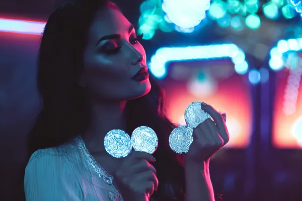 A person using their device against a moody casino-themed background, illustrating the smooth re-entry process at PKTK.